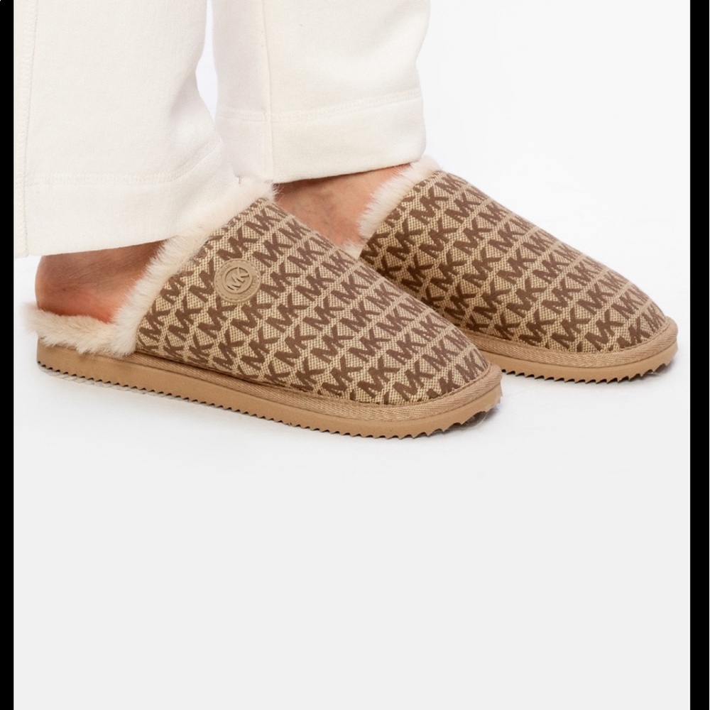 Michael Kors Janis faux fur slippers.